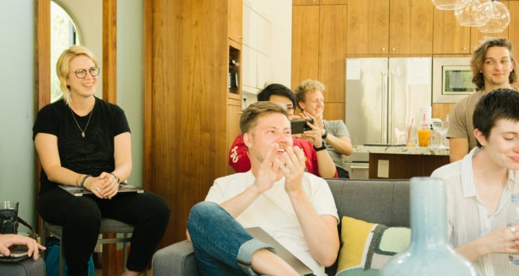 a group of younger people talking