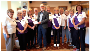 Weir Brown receiving cheque from Willowbrae Bowling Club Ladies Section, 2019